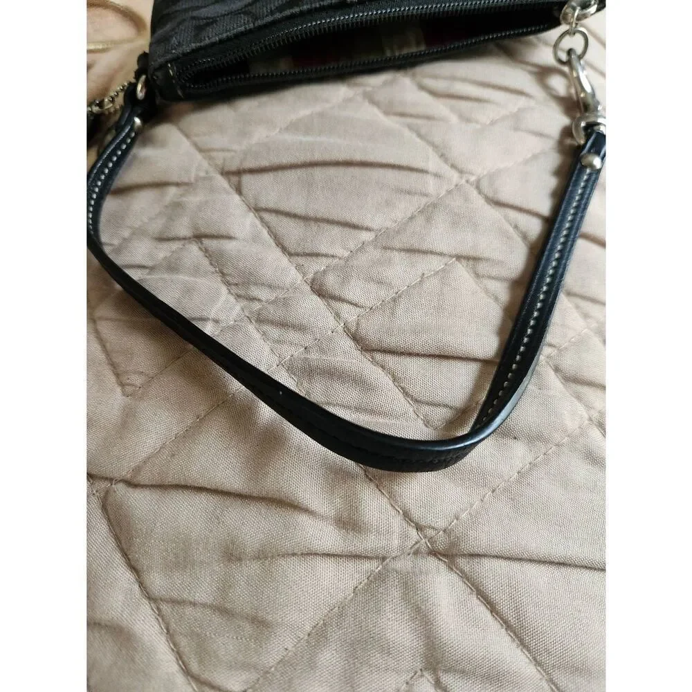 Coach black Signature Jacquard small Zip Wristlet with 65th anniversary lining